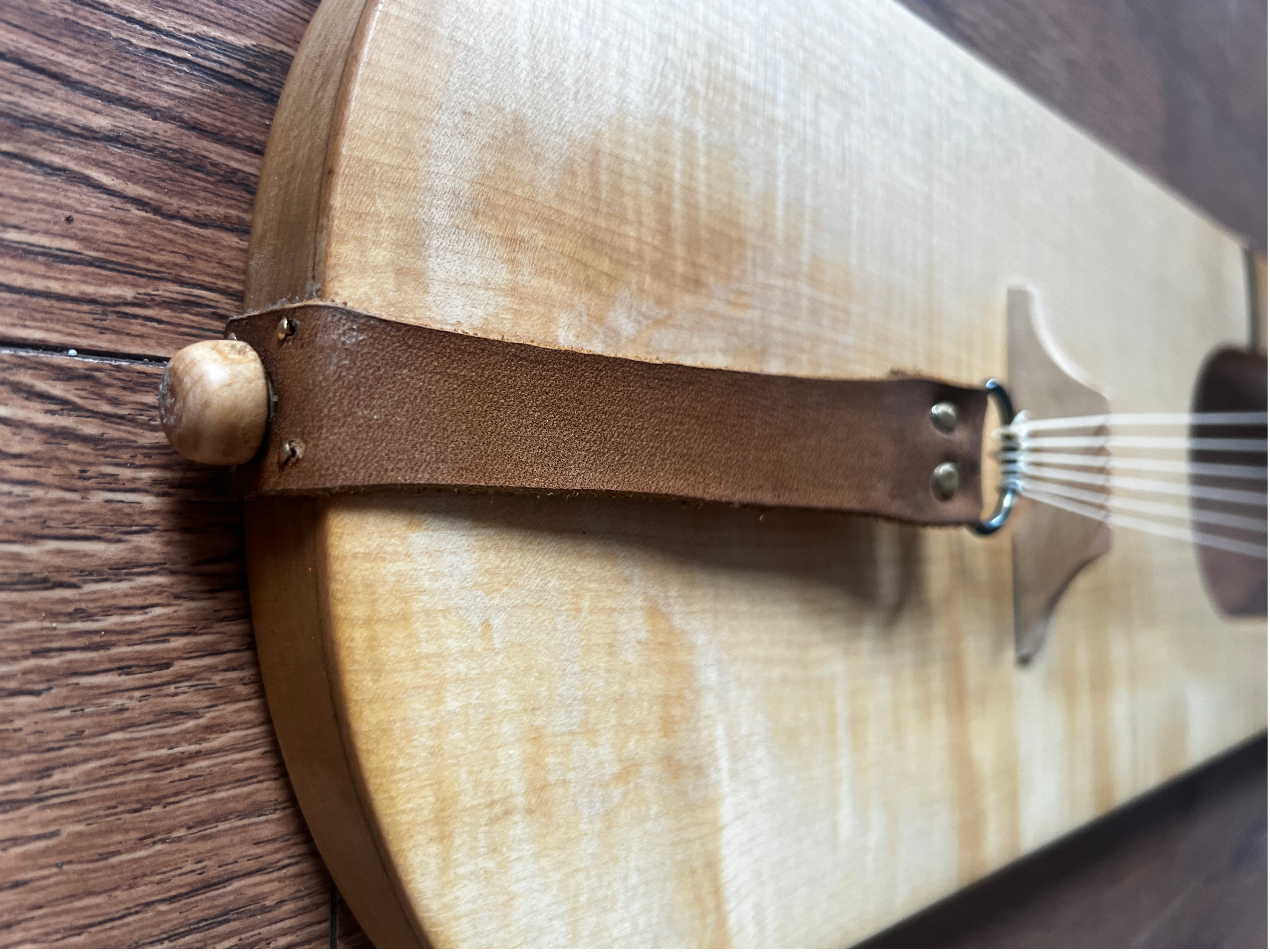 leather tailpiece 